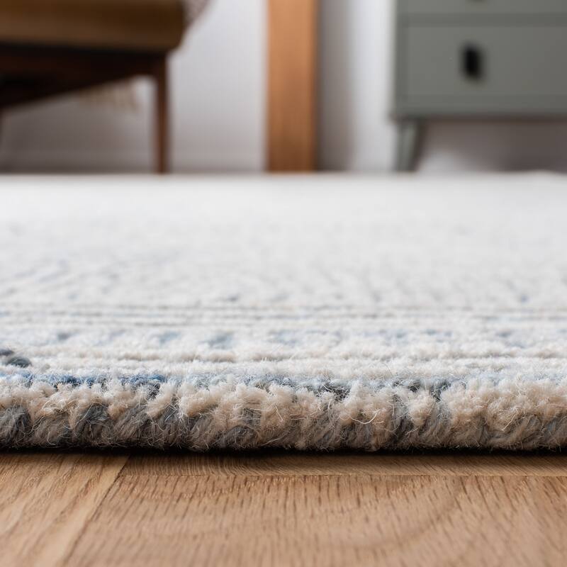 SAFAVIEH Handmade Abstract Leonide Modern Wool Rug