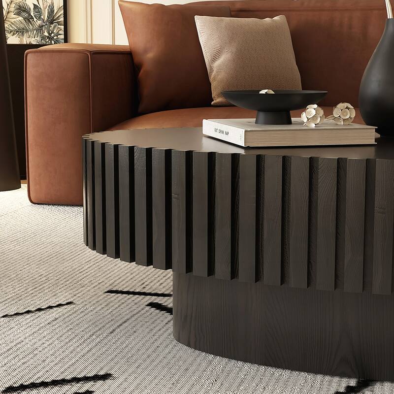 Oval Wooden Coffee Table with Handcrafted Relief and Sturdy Pedestal for Living Room