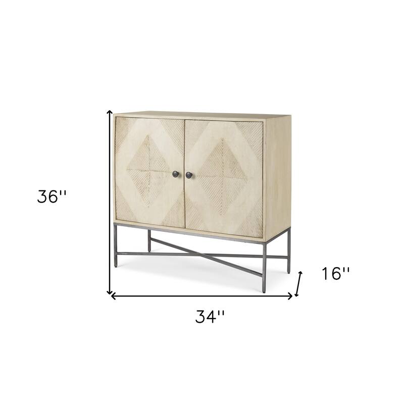 HomeRoots 36" Cream and Gray Solid Wood and Iron Carved Geometric Accent Cabinet With Two Doors