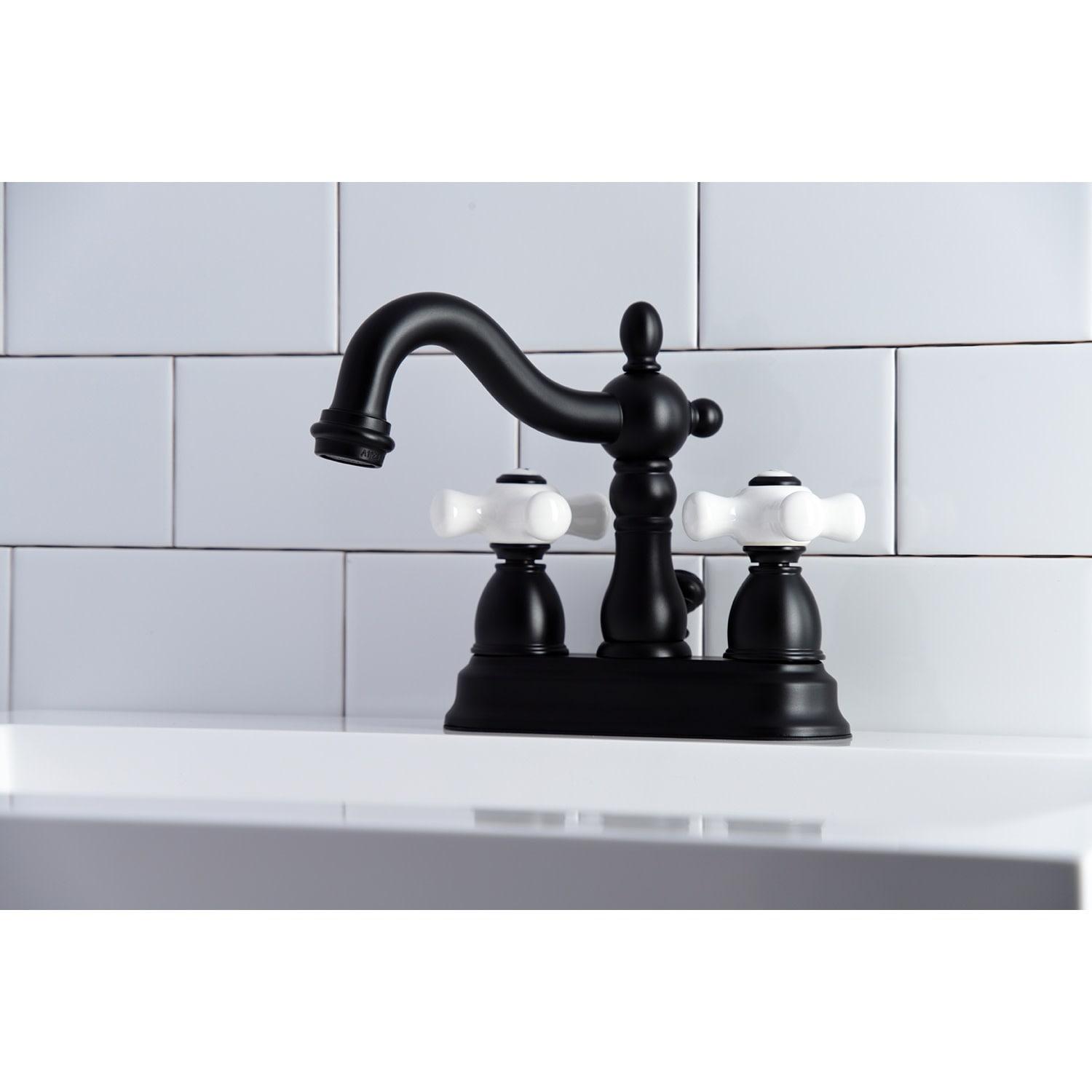 Kingston Brass Heritage Two-Handle 3-Hole Deck Mount 4 in. Centerset Bathroom Faucet