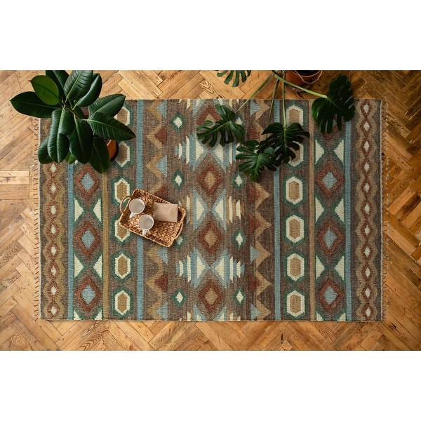 Alejandra Brown Handloomed Jute and Wool Blend Area Rug On Sale Bed