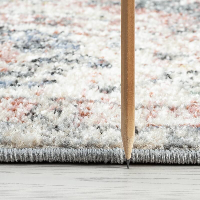 Addalyn Oriental Border Area Rug