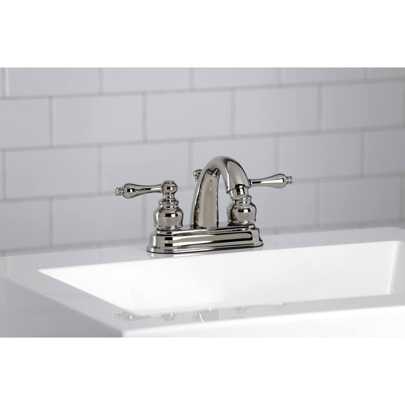 Kingston Brass Restoration Two-Handle 3-Hole Deck Mount 4 in. Centerset Bathroom Faucet
