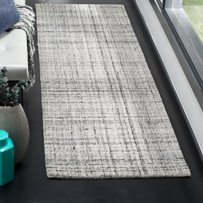 SAFAVIEH Handmade Abstract Nettie Modern Viscose Rug