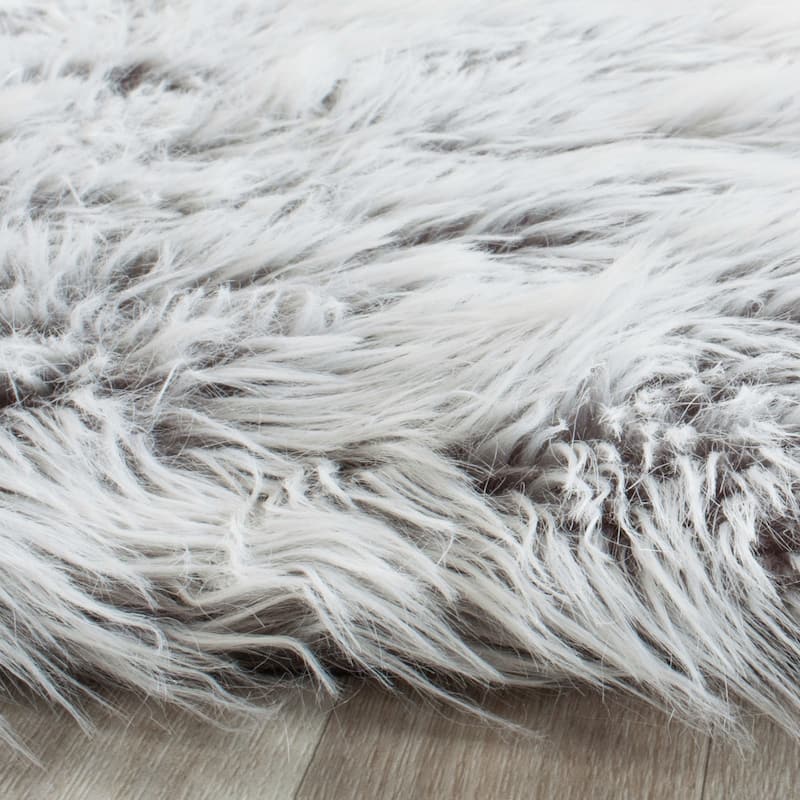 SAFAVIEH Faux Sheep Radena Christen Shag Solid Rug