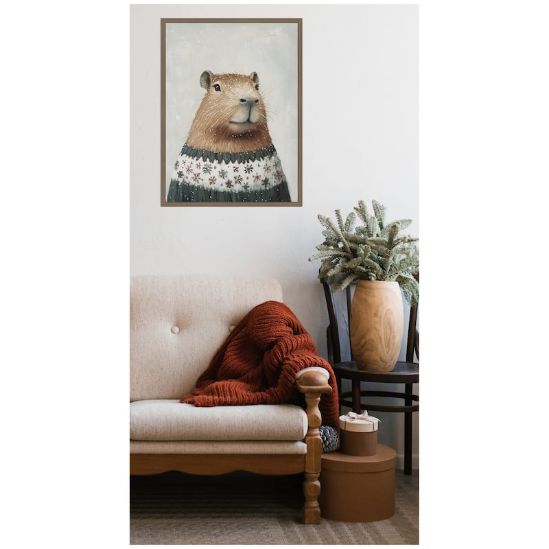 Kate and Laurel Sylvie Framed Canvas Capybara in Winter Snowflake Sweater by The Creative Bunch Studio