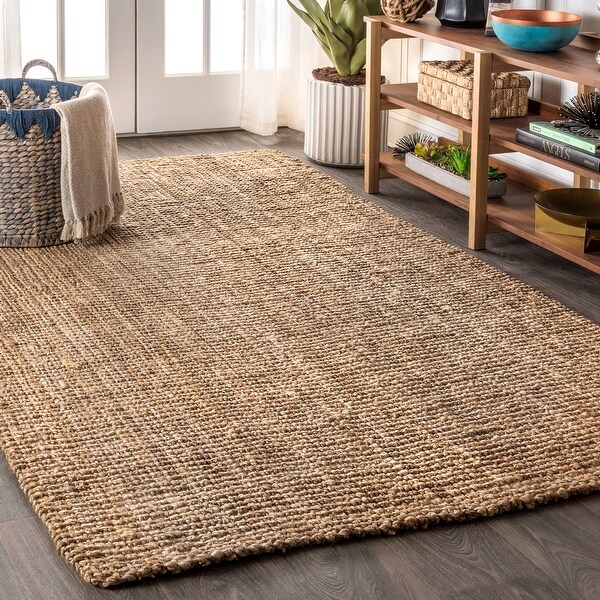 Pata Hand Woven Chunky Jute Area Rug. Opens flyout.