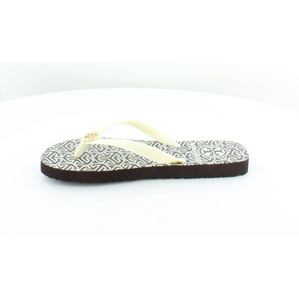 brown and white flip flops