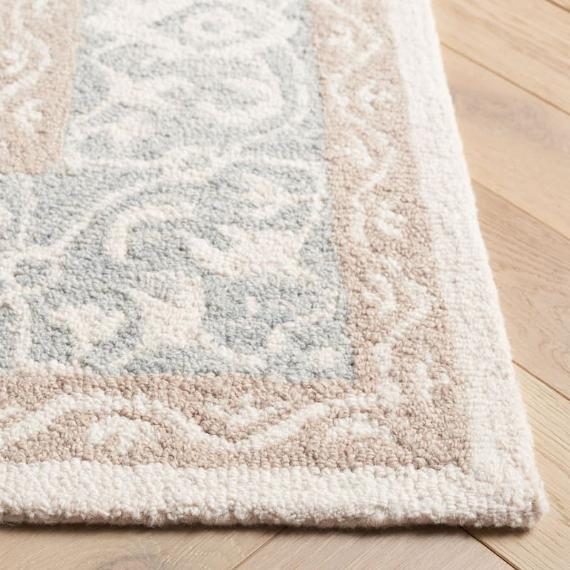 SAFAVIEH Handmade Ebony Tulun Wool Rug