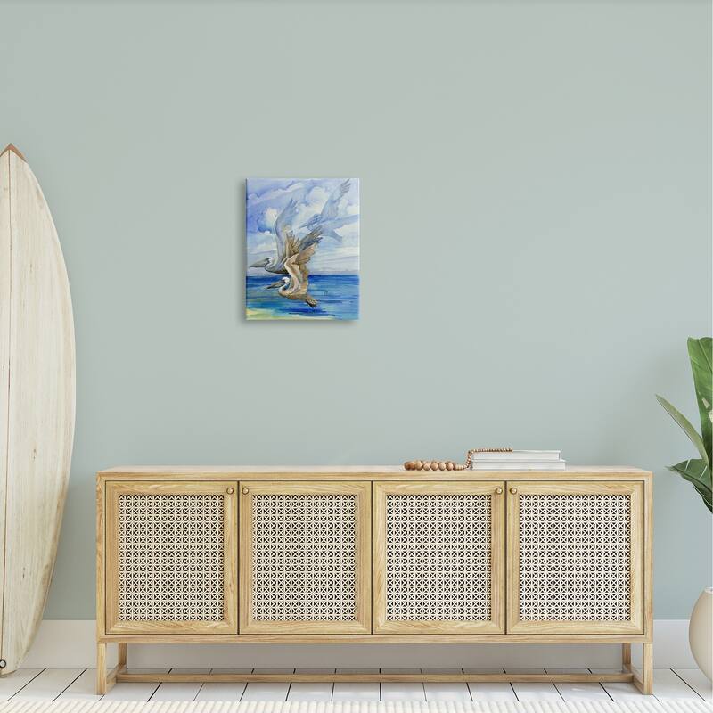 Stupell Pelicans Trio Over Ocean Shore Stretched Canvas Wall Art, Design by Paul Brent