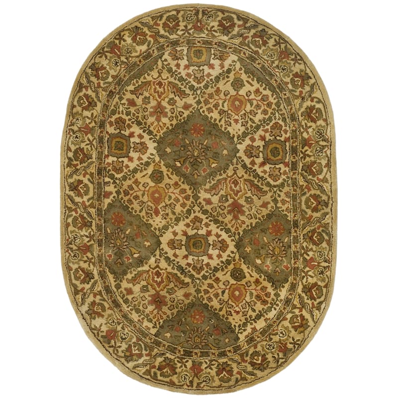 SAFAVIEH Handmade Antiquity Allegonde Traditional Oriental Wool Rug - 7'6" x 9'6" Oval - Beige