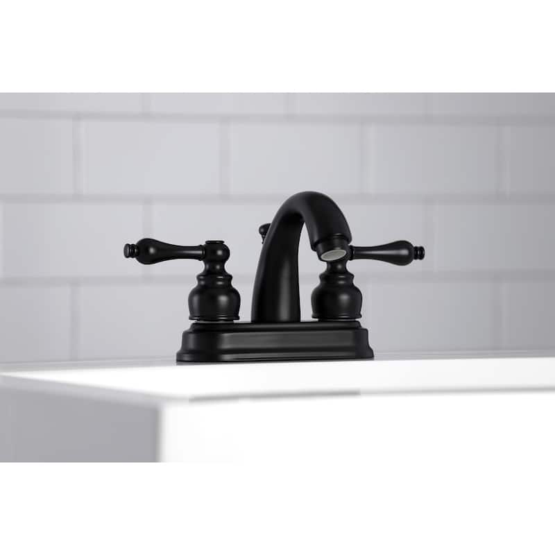 Kingston Brass Restoration Two-Handle 3-Hole Deck Mount 4 in. Centerset Bathroom Faucet