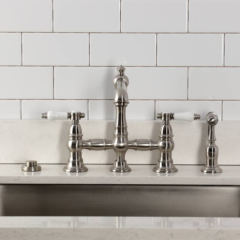 Kingston Brass Bel-Air Two-Handle 4-Hole Deck Mount Bridge Kitchen Faucet with Brass Side Sprayer