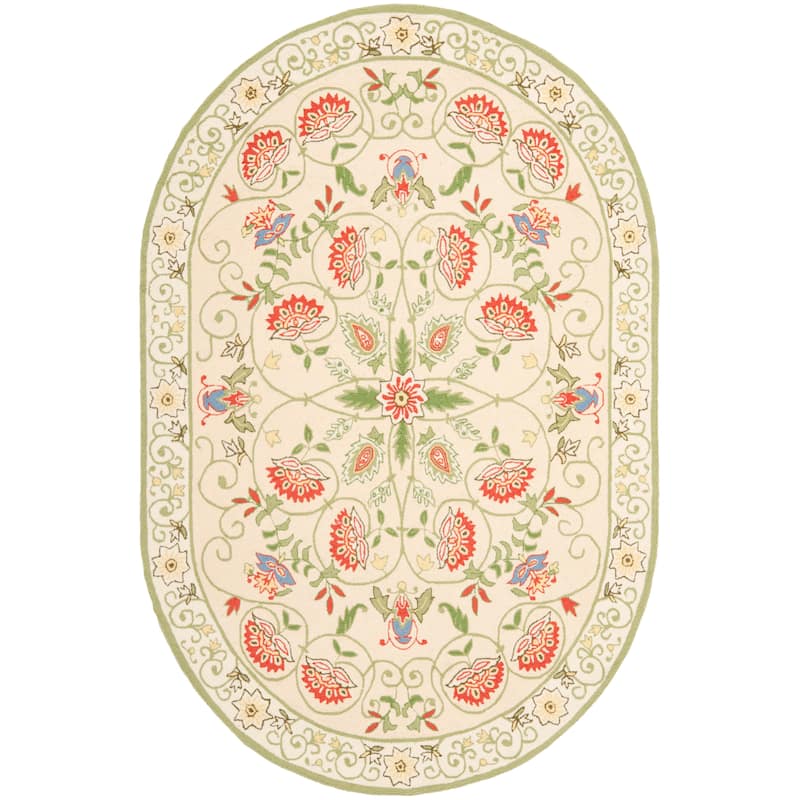 SAFAVIEH Handmade Chelsea Alecsandra French Country Wool Rug - 4'6" x 6'6" Oval - Beige/Green