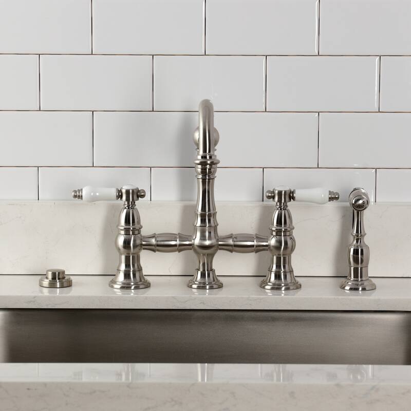 Kingston Brass Bel-Air Two-Handle 4-Hole Deck Mount Bridge Kitchen Faucet with Brass Side Sprayer