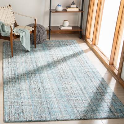 SAFAVIEH Handmade Abstract Nettie Modern Viscose Rug
