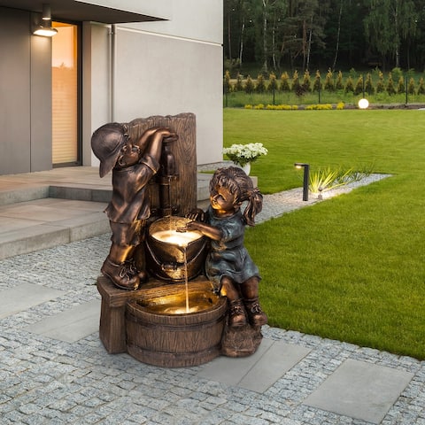 Glitzhome 26"H Polyresin Boy& Girl LED Sculptural Outdoor Fountain