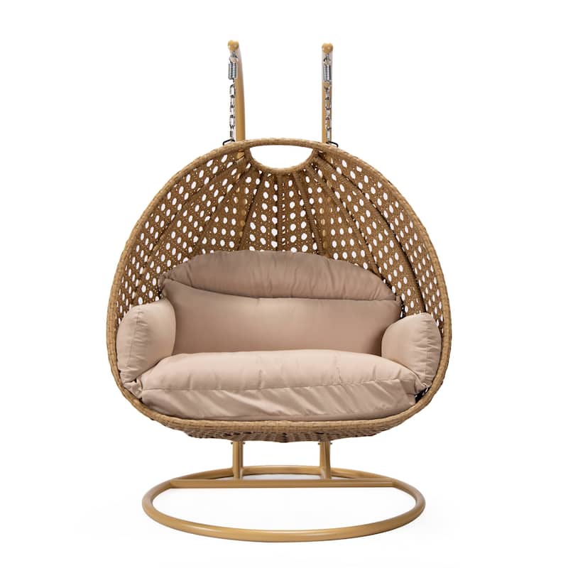 LeisureMod Mendoza 2-Person Hanging Egg Swing Chair - Handcrafted Light Brown Wicker, Patio Hammock Lounger with Cushions - 53"