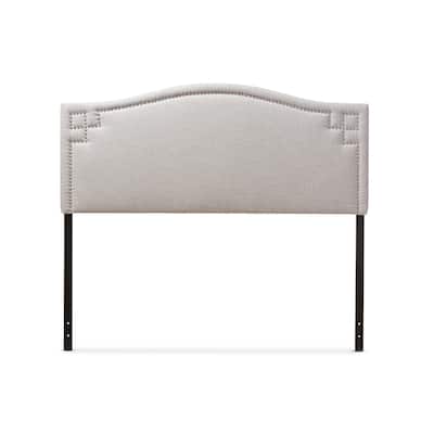 Glamorous Upholstered Fabric Headboard with Nailhead Detailing and Adjustable Height for a Luxurious Bedroom