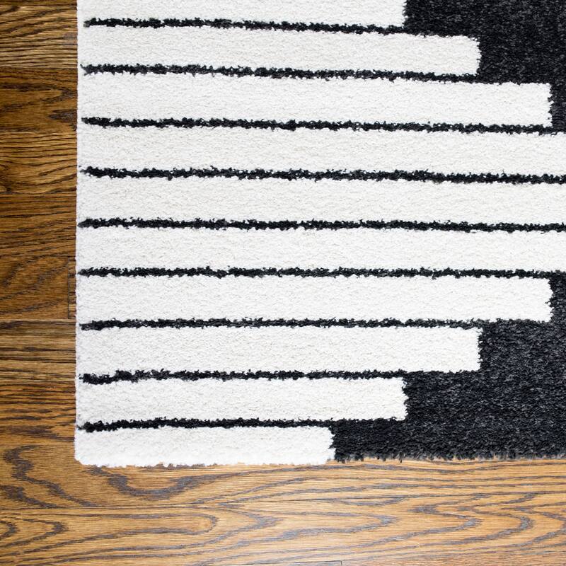 Carson Carrington Salsaker Geometric Area Rug