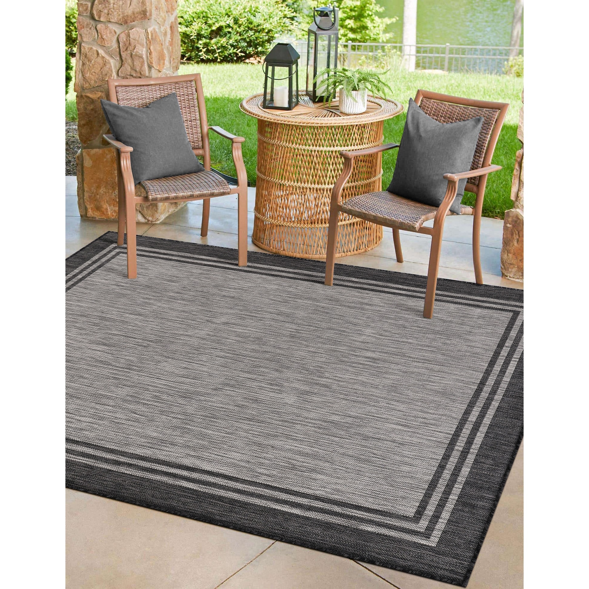 https://ak1.ostkcdn.com/images/products/is/images/direct/c2af2d1ebac4aab6c84a595fb2eaeb5968a358e0/Washable-Bordered-Indoor-Outdoor-Rug-for-Patio%2C-Deck%2C-Porch.jpg