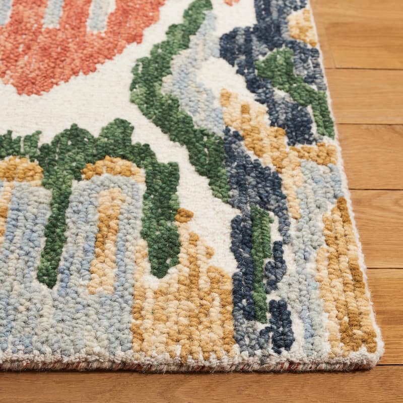SAFAVIEH Handmade Ikat Katiuscia Bohemian Wool Rug