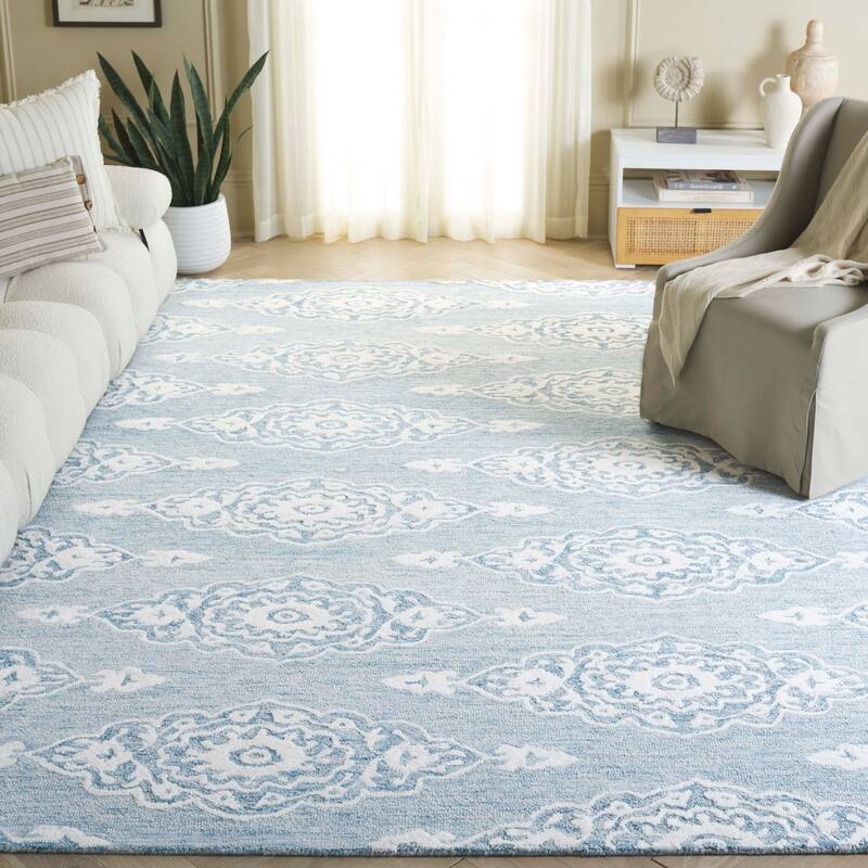 SAFAVIEH Handmade Ebony Ysaline Modern Wool Rug - 8' x 10' - Ivory/Light Blue