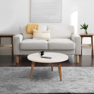 24 Inch Modern Coffee Table, Round Off White MDF Top, Tapered Brown Mango Wood Legs