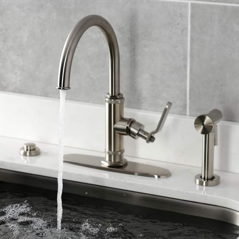 Kingston Brass Whitaker Single-Handle Deck Mount Kitchen Faucet with Brass Sprayer