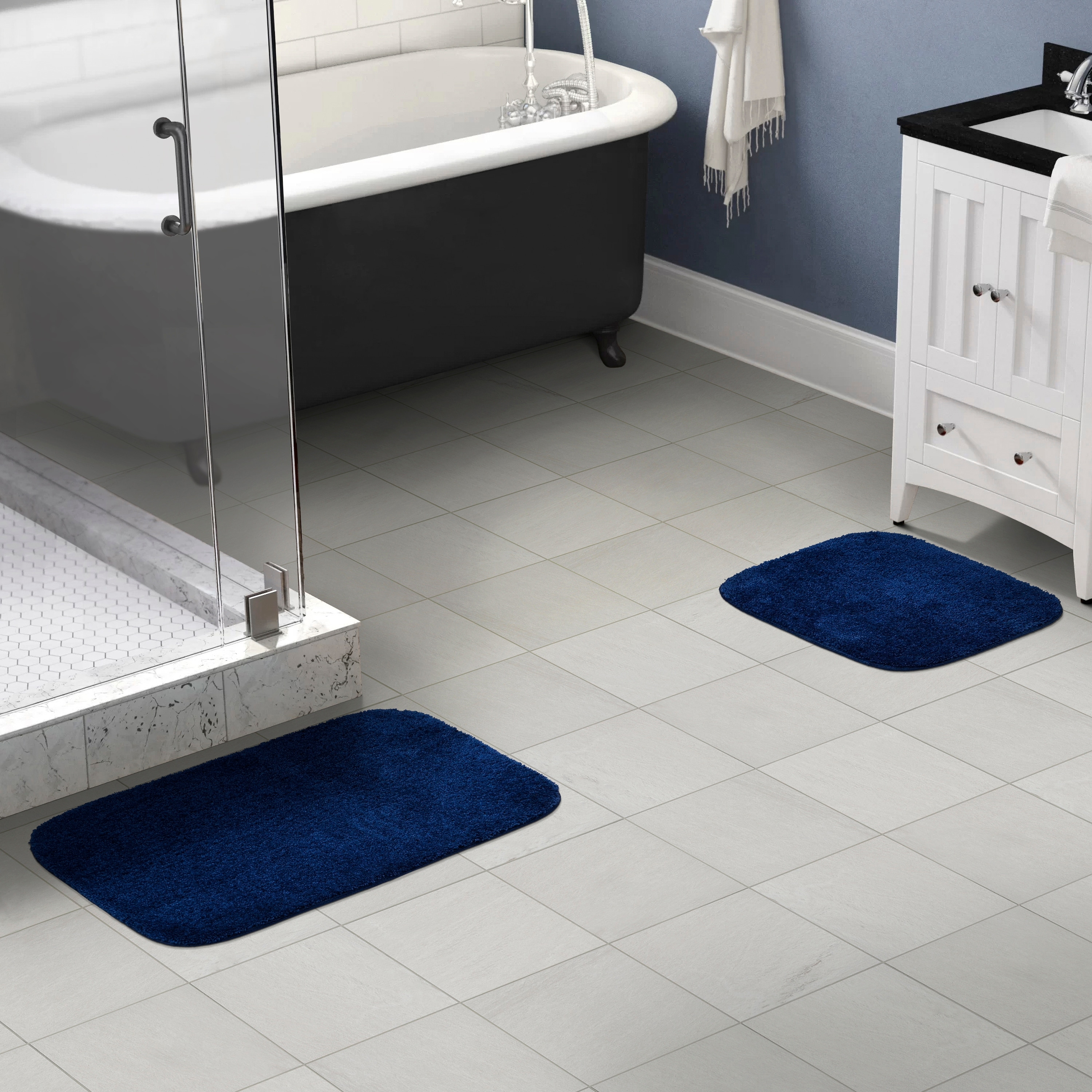 https://ak1.ostkcdn.com/images/products/is/images/direct/c3183121628a1e26aad27674090d7b2ca2ffb71d/Traditional-Plush-Washable-Nylon-Bathroom-Rug.jpg