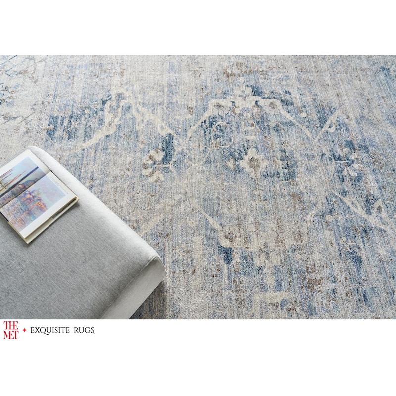 The Met X Exquisite Rugs Vintage Looms Light Blue/Beige Area Rug.