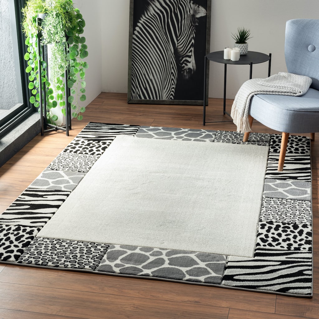 Crystal Collection Animal Print Border Design Area Rug