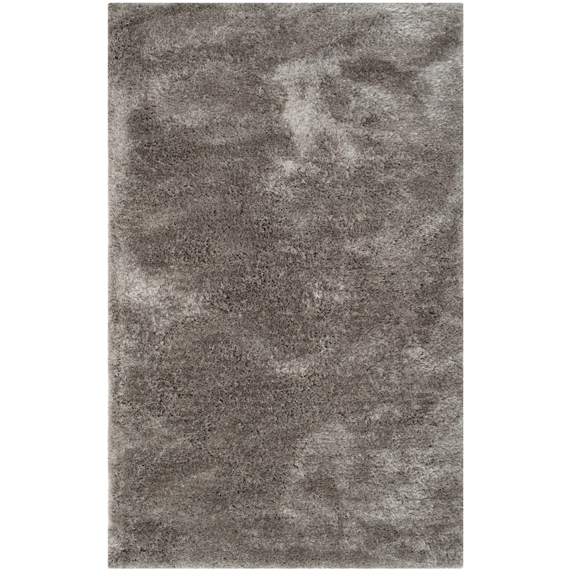 SAFAVIEH Handmade South Beach Leonella Shag Solid Polyester Rug