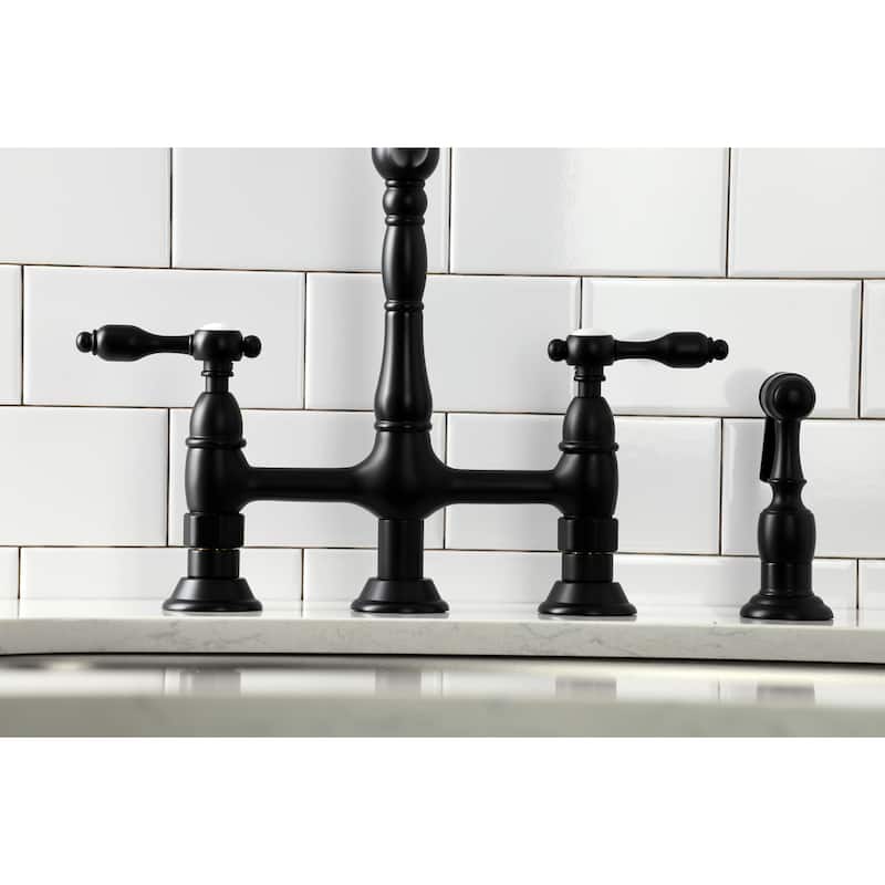Kingston Brass Tudor Bridge Kitchen Faucet with Brass Sprayer