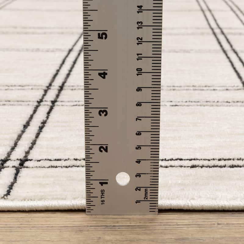 Hansel Updated Plaid Beige/ Black Area Rug