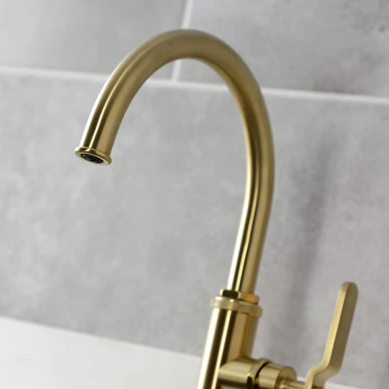 Kingston Brass Whitaker Single-Handle Deck Mount Kitchen Faucet with Brass Sprayer