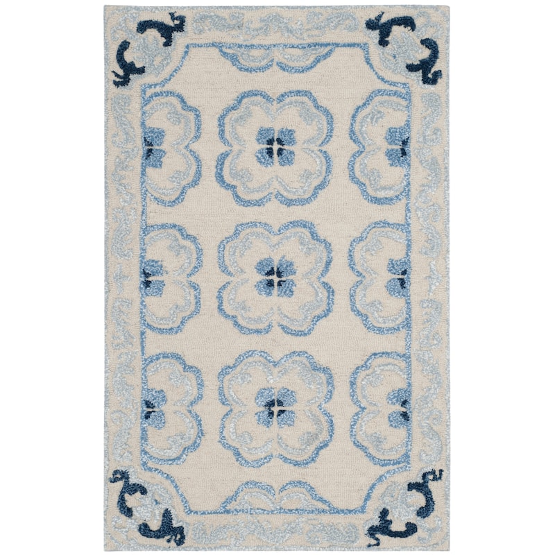 SAFAVIEH Handmade Bella Nursel Modern Floral Wool Rug - 2'6" x 4' - Ivory/Blue