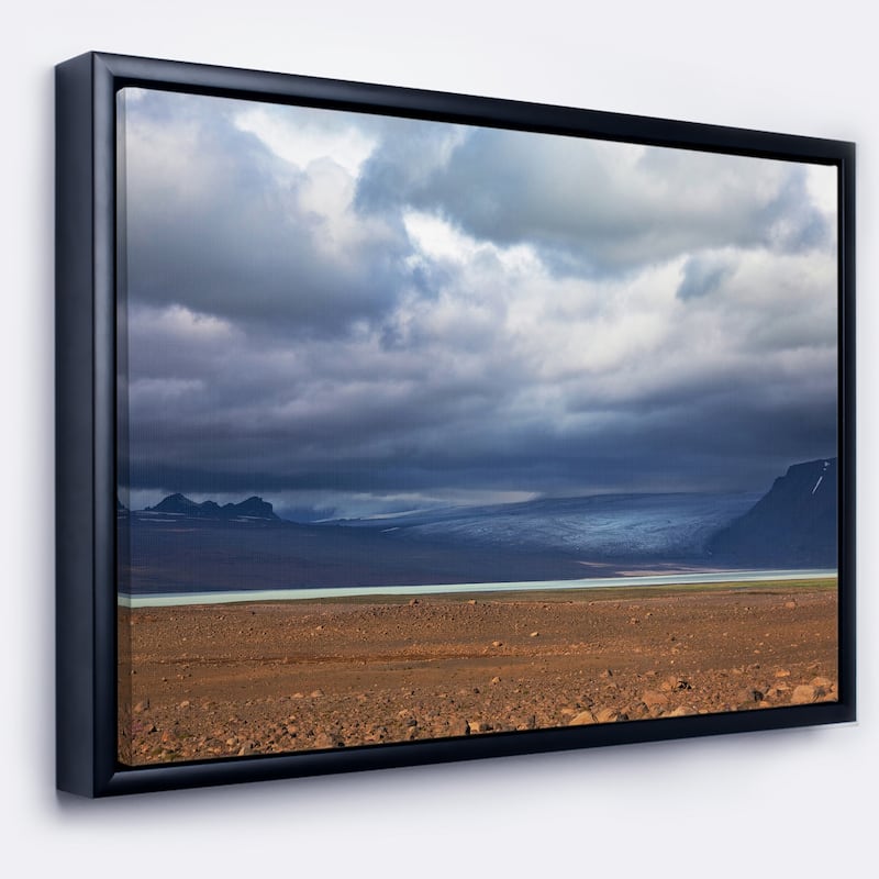 Designart "Stretch of Land under Blue Sky" Landscape Artwork Print on Framed Canvas - 60 in. wide x 28 in. high - Black