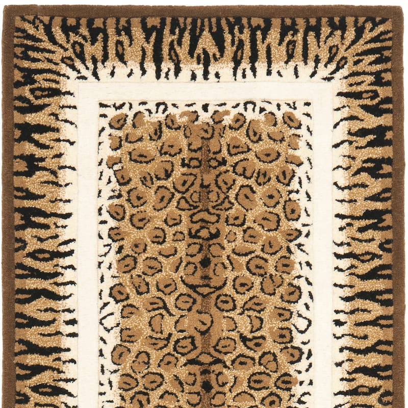 SAFAVIEH Handmade Reelika Doshie Modern Animal Wool Rug