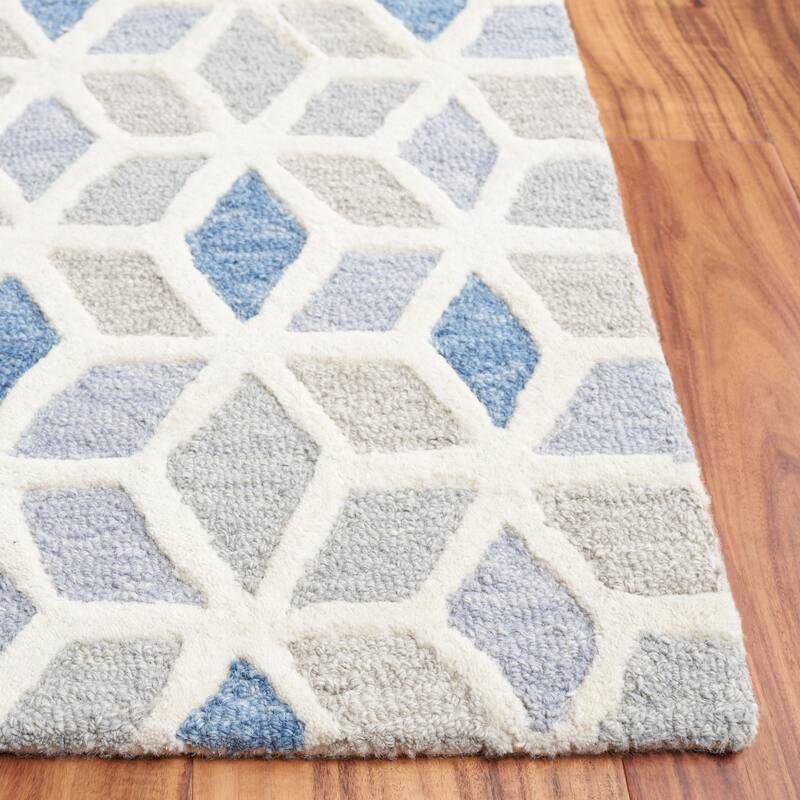 SAFAVIEH Handmade Ebony Yulia Modern Wool Rug