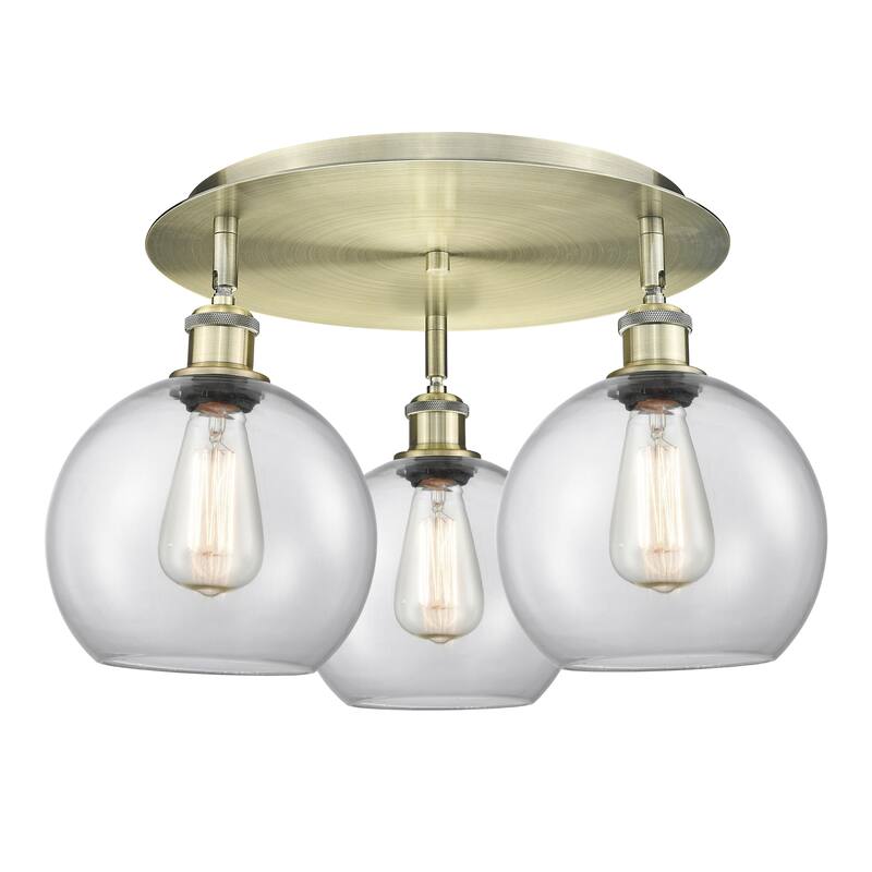 Innovations Lighting Athens - 3 Light 20" Flush Mount - Antique Brass/Clear