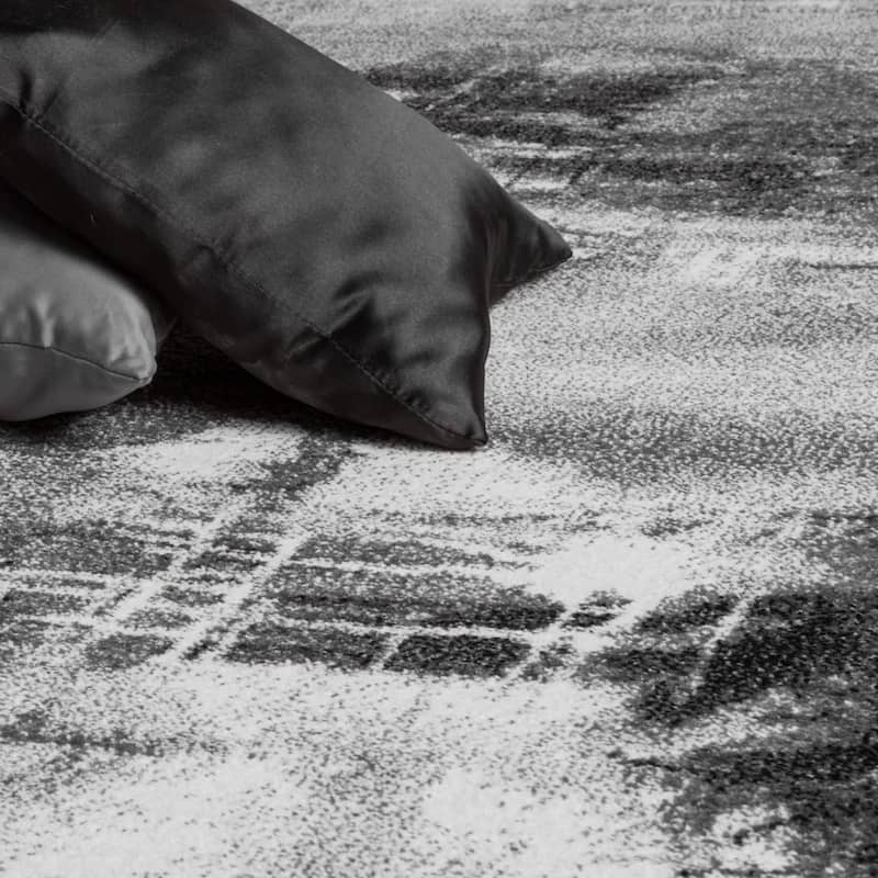 Artful Area Rug with Mottled Design Pattern in Grey