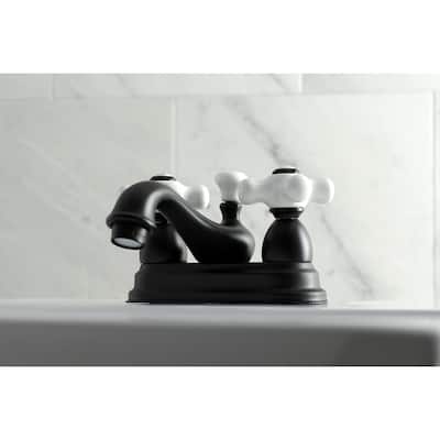 Kingston Brass Restoration Two-Handle 3-Hole Deck Mount 4 in. Centerset Bathroom Faucet
