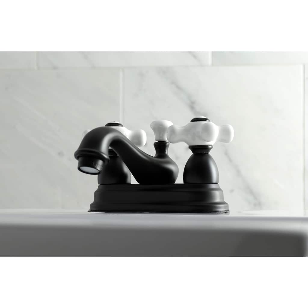 Kingston Brass Restoration Two-Handle 3-Hole Deck Mount 4 in. Centerset Bathroom Faucet