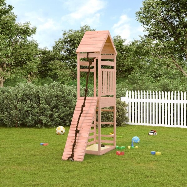 outdoor playhouse with climbing wall