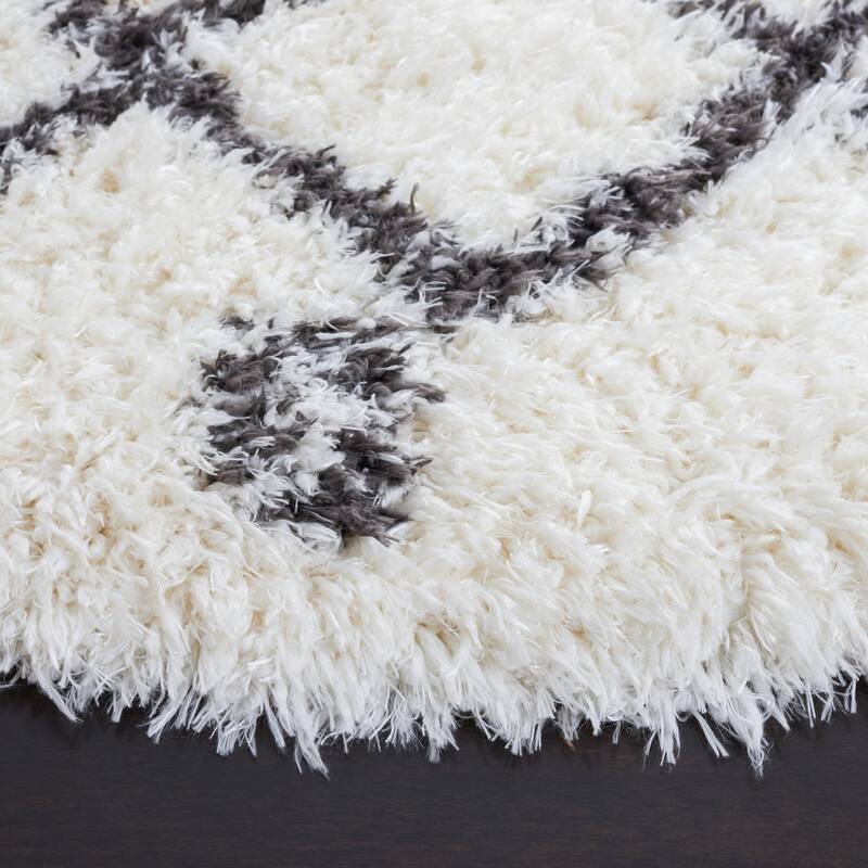 SAFAVIEH Handmade Flokati Theresie Shag Solid Polyester Rug