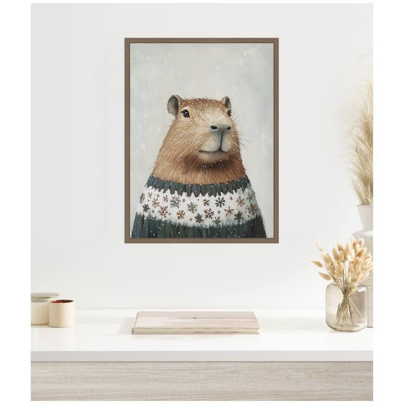 Kate and Laurel Sylvie Framed Canvas Capybara in Winter Snowflake Sweater by The Creative Bunch Studio