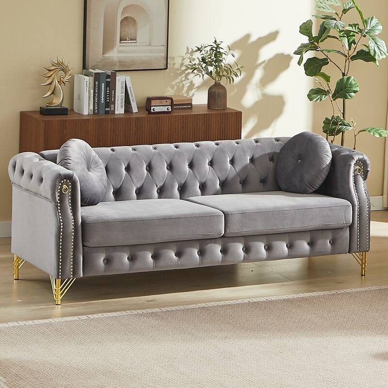 Chesterfield Sofa with Two Round Pillows, Featuring Copper Stud Detailing and Tufted Button Accents - Grey