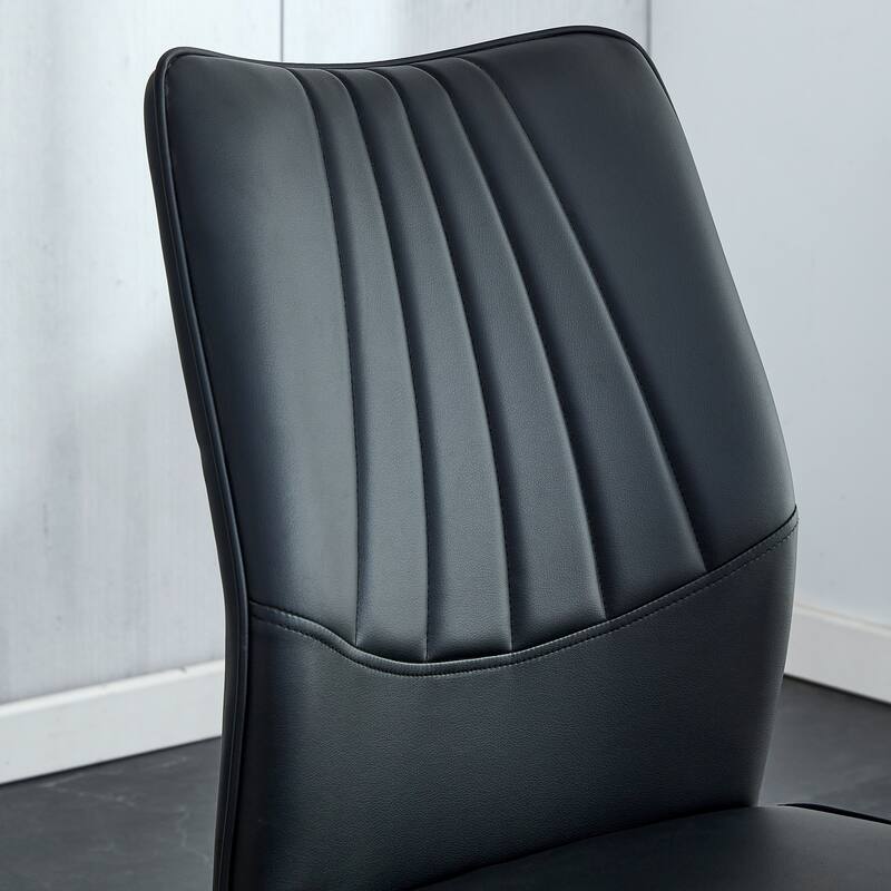 Four black dining chairs,Modern chairs from the Middle Ages. Made of PU material cushion and silver metal legs