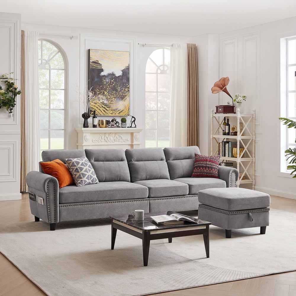 Gray sectional outlet with nailhead trim